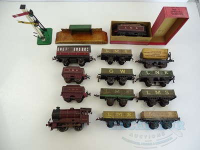Lot 701 - A group of HORNBY O gauge items comprising...