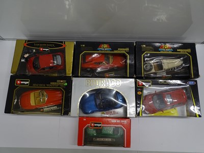Lot 157 - A group of boxed 1:18 scale diecast cars by...