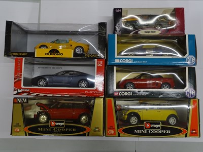 Lot 158 - A group of boxed 1:18 scale diecast cars by...