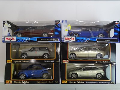 Lot 167 - A group of boxed 1:18 scale diecast MAISTO...