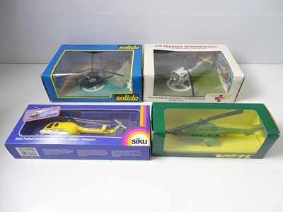 Lot 174 - A group of diecast helicopters by SIKU, SOLIDO...