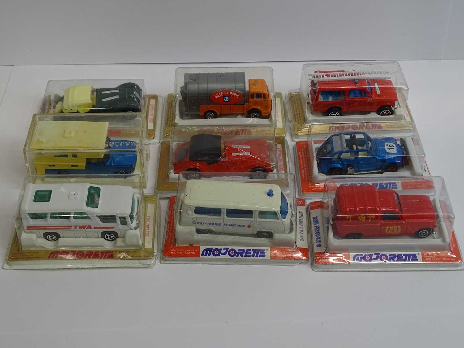 Lot 46 - A group of MAJORETTE vans and cars all sealed...