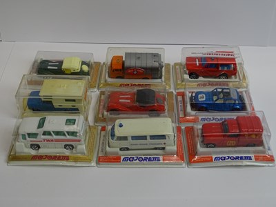 Lot 46 - A group of MAJORETTE vans and cars all sealed...