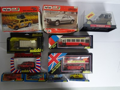 Lot 91 - A group of mixed scale diecast models of cars,...