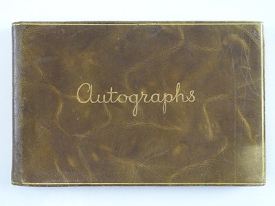 Lot 39 - A vintage autograph book containing a NOEL...