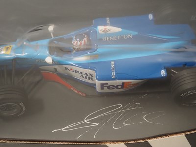 Lot 15 - A group of MINICHAMPS 1:18 scale Formula 1...