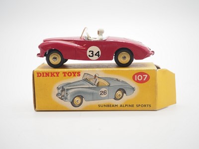 Lot 179 - A DINKY No 107 Sunbeam Alpine Sports Car -...