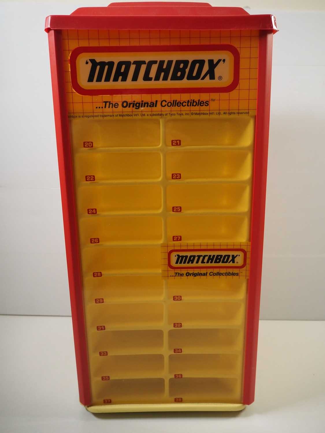 Lot 2 - A MATCHBOX 1-75 rotating shop display carousel,...