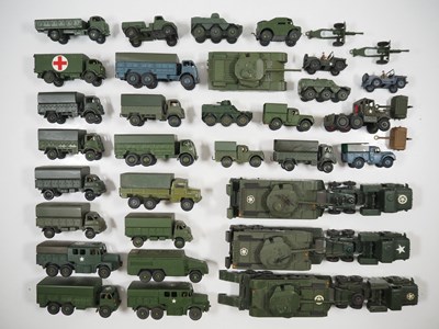 Lot 62 - A large group of playworn DINKY military...