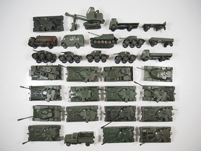 Lot 77 - A large group of playworn CORGI military...