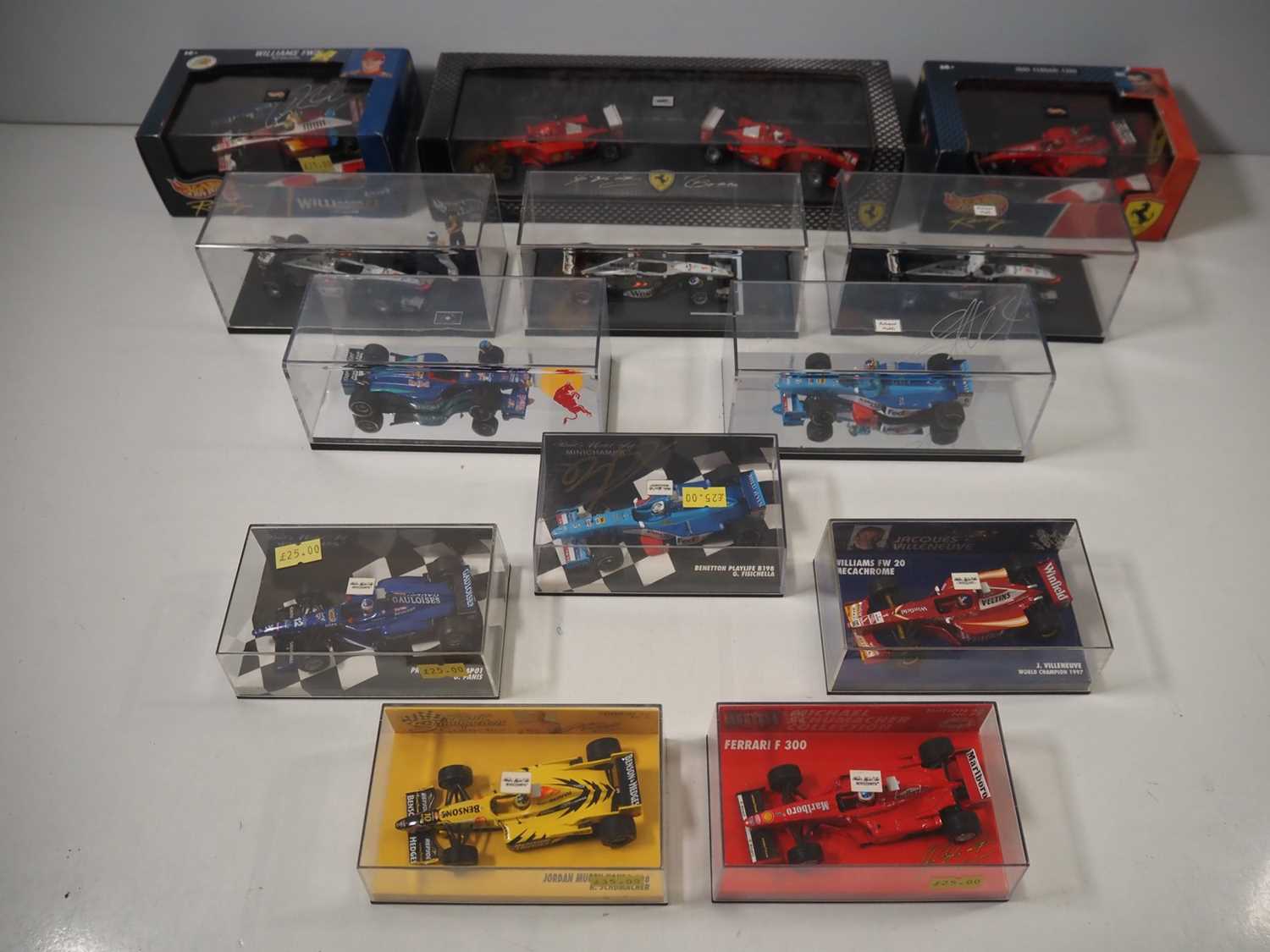 Lot 9 - A group of HOTWHEELS and MINICHAMPS 1:43 scale...