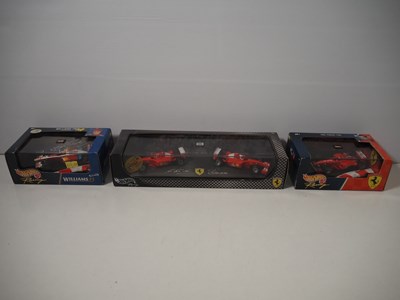 Lot 9 - A group of HOTWHEELS and MINICHAMPS 1:43 scale...