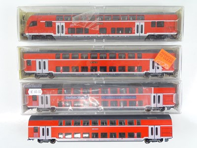 Lot 124 - A group of HO Gauge German Outline double deck...
