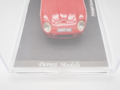 Lot 18 - A pair of 1:43 scale hand built resin models...