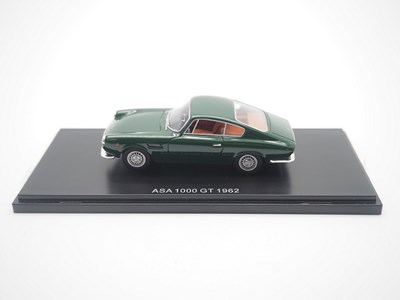 Lot 18 - A pair of 1:43 scale hand built resin models...
