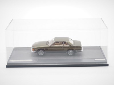 Lot 24 - A pair of hand built 1:43 scale resin models...