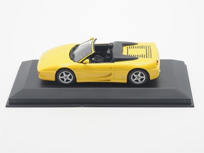 Lot 26 - A group of 1:43 scale models by MINICHAMPS,...