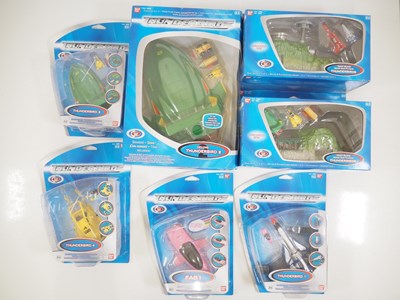 Lot 117 - A group of BANDAI Thunderbirds vehicles and...