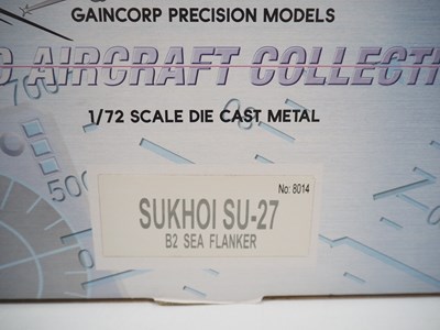 Lot 13 - A pair of diecast model planes comprising a...