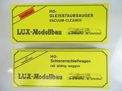 Lot 231 - A pair of HO Gauge rail and track cleaning...
