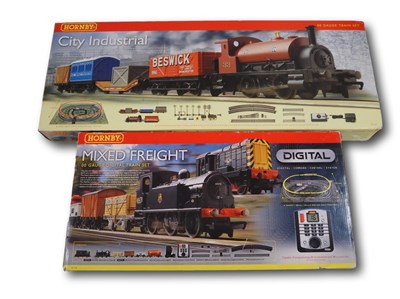 Lot 409 - A pair of HORNBY OO gauge train sets...