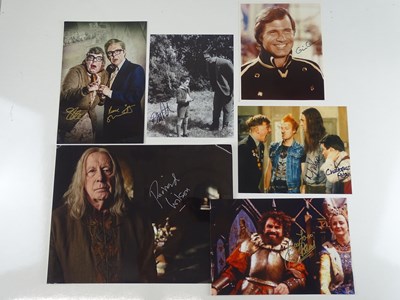 Lot 7 - A group of signed colour and black/white...