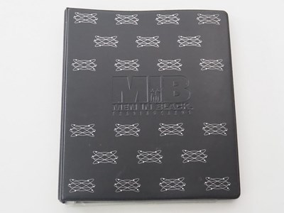 Lot 35 - MEN IN BLACK - An official binder of modern...