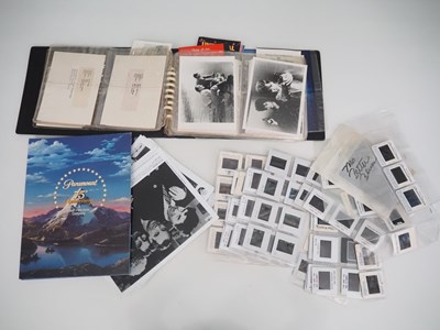 Lot 87 - A folder of mixed black/white stills, press...