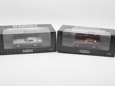 Lot 402 - A pair of hand built resin 1:43 scale models...