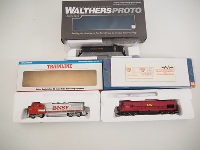 Lot 186 - A group of HO gauge American outline diesel...