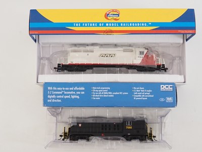 Lot 192 - A pair of HO gauge American outline diesel...