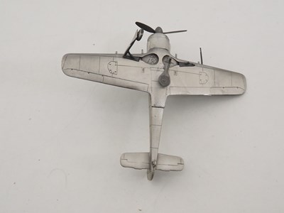 Lot 44 - A group of pewter models of military aircraft...