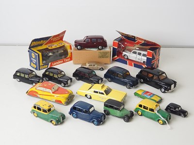 Lot 2 - A group of boxed and unboxed mixed scale Taxis...