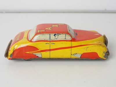 Lot 2 - A group of boxed and unboxed mixed scale Taxis...