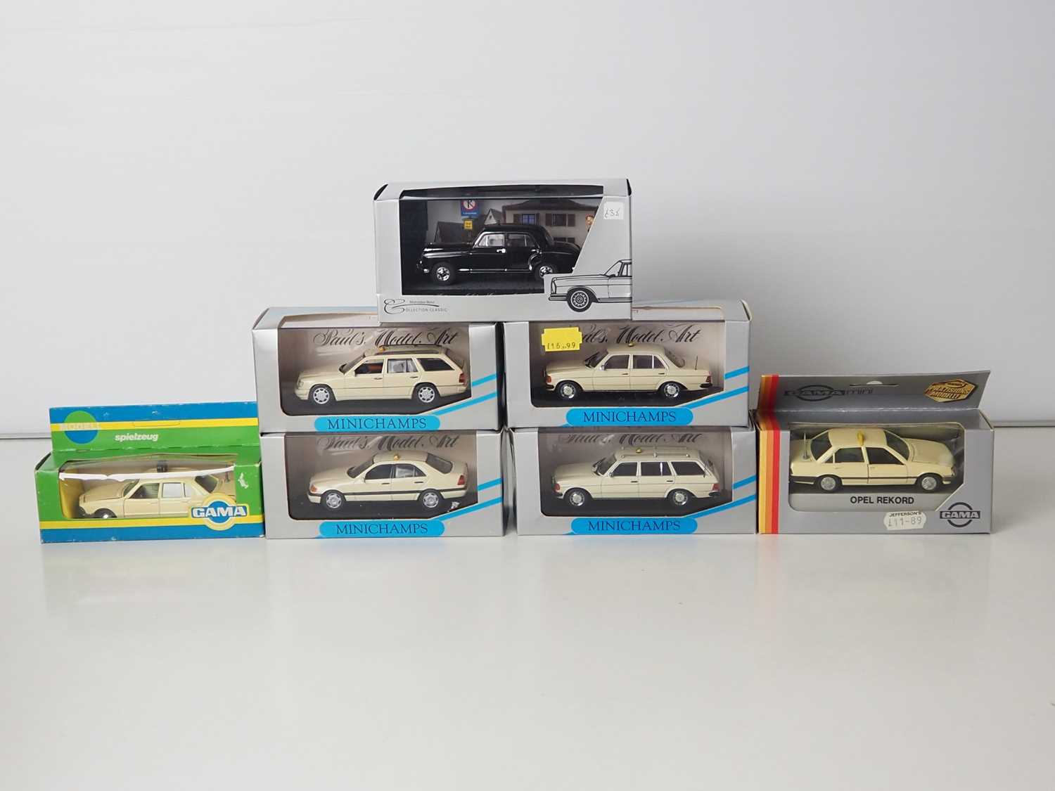 Lot 11 - A group of 1:43 scale diecast models by FALLER,...