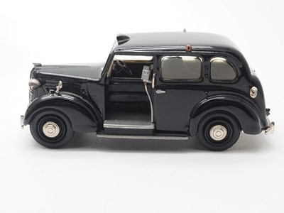Lot 17 - A trio of hand built white metal models by...