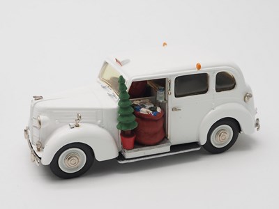 Lot 17 - A trio of hand built white metal models by...