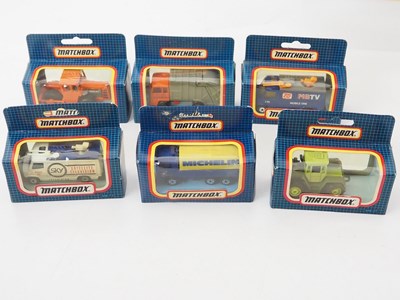 Lot 41 - A mixed group of boxed diecast vans, buses etc...