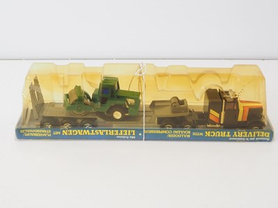 Lot 44 - A mixed group of boxed diecast vans, buses,...