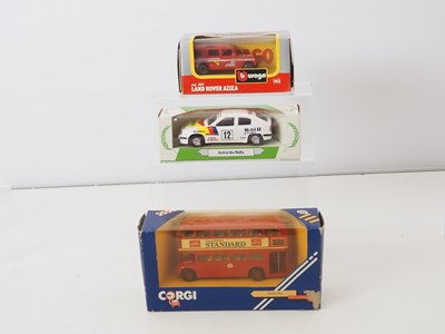 Lot 44 - A mixed group of boxed diecast vans, buses,...