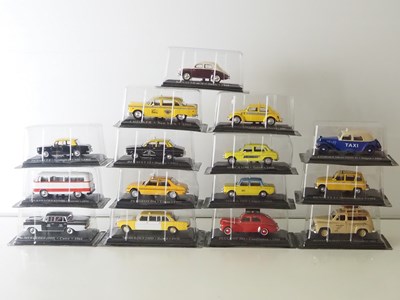 Lot 58 - A group of diecast 1:43 scale model Taxis by...