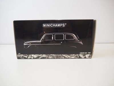 Lot 127 - A MINICHAMPS 1:18 scale diecast model of a...