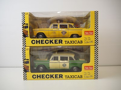 Lot 128 - A pair of 1:18 scale diecast model 1981...