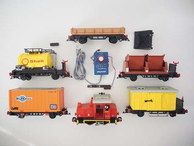 Lot 517 - A group of PLAYMOBIL G scale trains and...