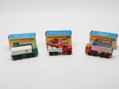 Lot 5 - A group of MATCHBOX Regular Wheels lorries,...