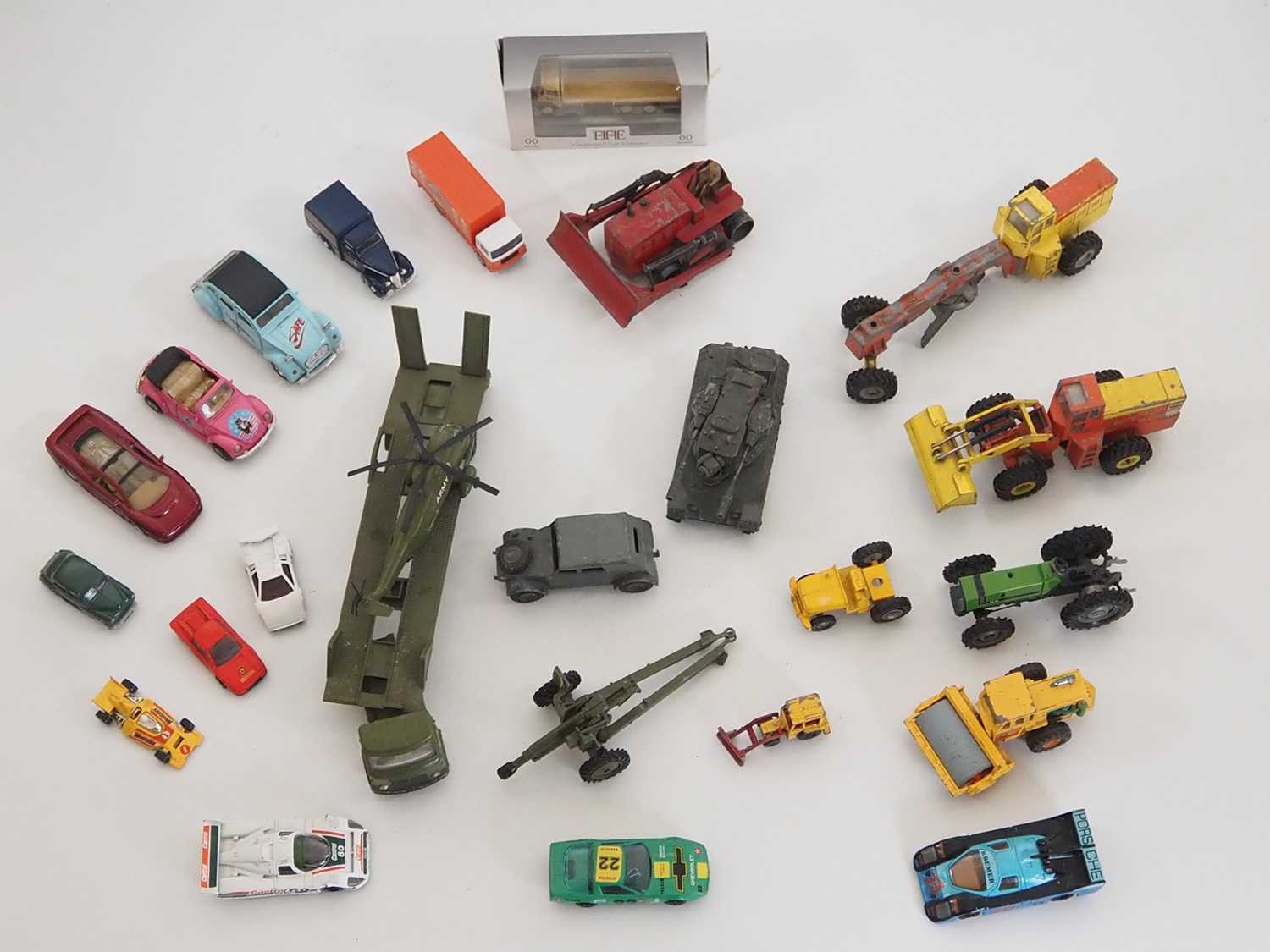 Lot 29 - A group of mostly unboxed diecast to include...