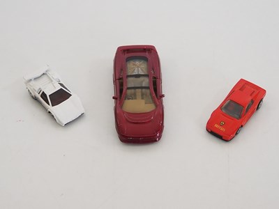 Lot 29 - A group of mostly unboxed diecast to include...