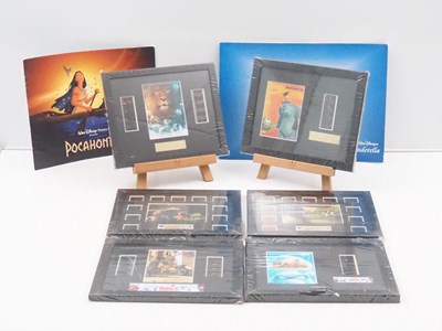 Lot 43 - A group of framed film cels comprising: THE...
