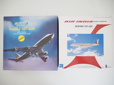 Lot 15 - A pair of diecast model airplanes comprising a...