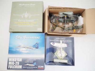 Lot 18 - A group of boxed and unboxed diecast aircraft,...